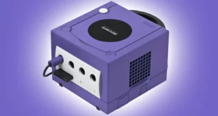 Purple Nintendo GameCube gaming console on gradient background.