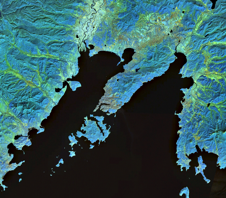 Bay of Peter the Great with the Muravyov-Amurskiy Peninsula in the center and Russkii Island to the southwest of it. The city of Vladivostok is located on both the southwest of the
