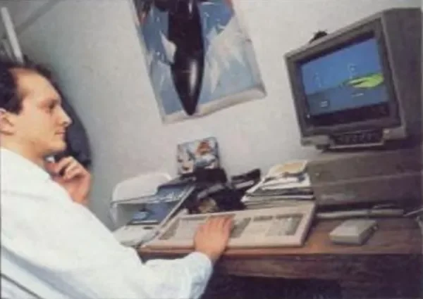 Programmer Peter Warnes working at the Argonaut office