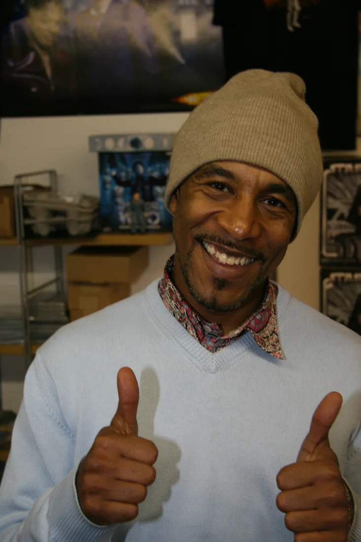 Actor Danny John-Jules smiling and giving two thumbs up at Play.com Live in 2008