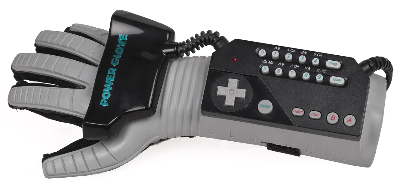 Mattel Power Glove with its gray finger sensors, black knuckle tracker and forearm keypad