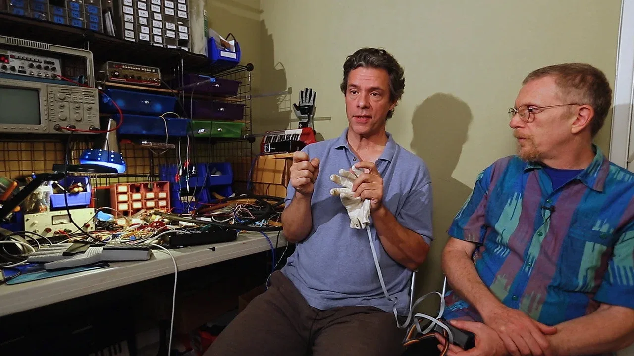 Thomas Zimmerman at left demonstrating early glove hardware beside Sam Wantman