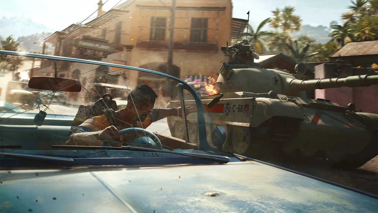 Far Cry 6 gameplay shows armed guerrillas riding in a car through Yara