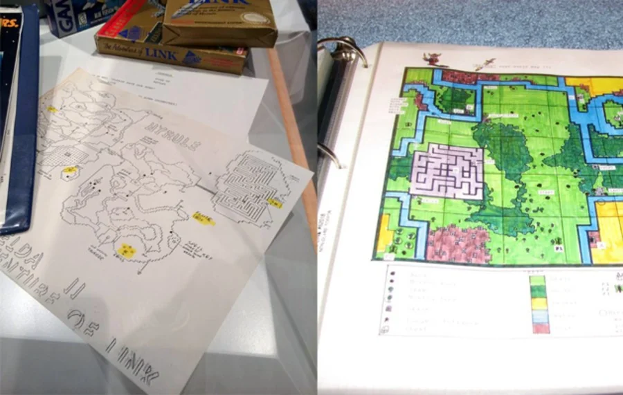 Hand drawn game maps and printed colored Zelda map spread across a desk